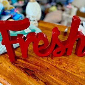 Red metal “FRESH” sign for the kitchen brand-new